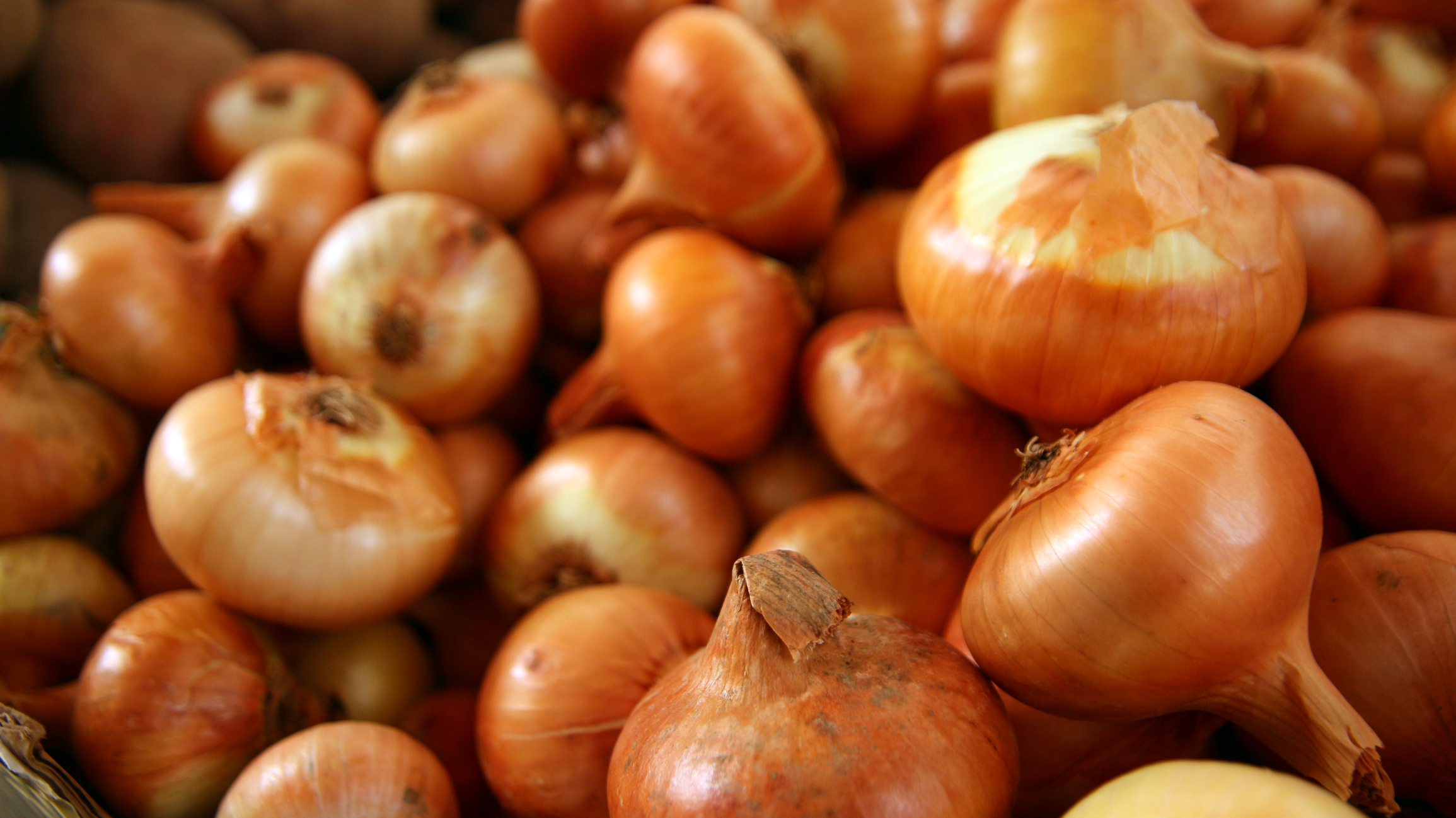 A bunch of sweet onions, which are not usually used in mirepoix vegetables. 