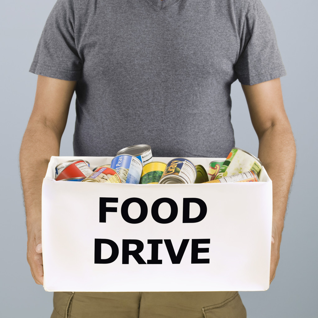 Man holding food drive box