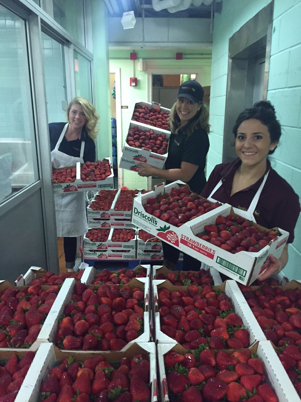 Freshpoint Sales reps washing berries from left to right – Daeghan Hawke, Jessi Daschner, Antonina Castagnola